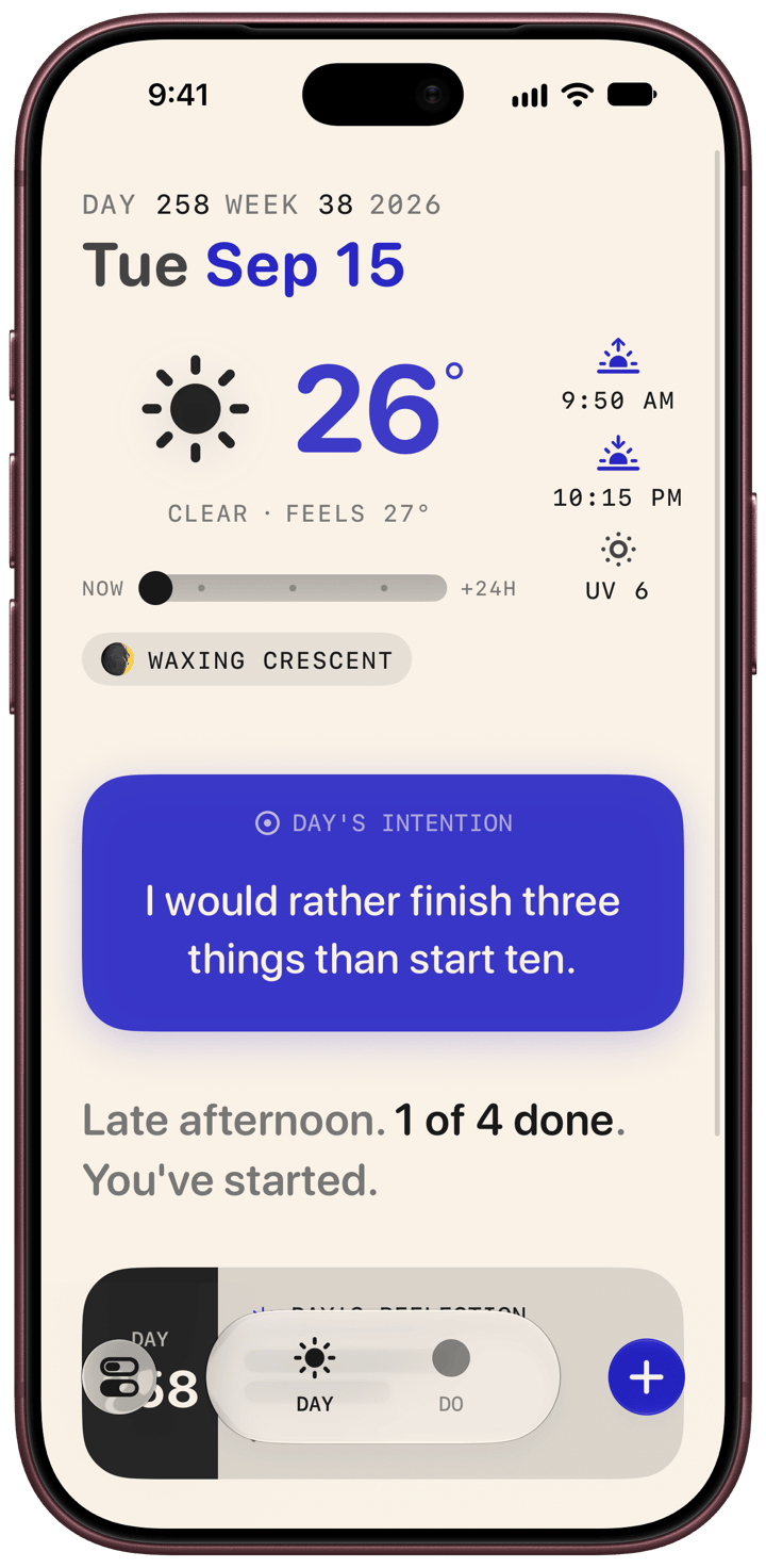 The Day view in Solarday on an iPhone. Day 258, Week 38, 2026. Tuesday September 15. Clear, 26 degrees, feels like 27. Sunrise 9:50 AM, sunset 10:15 PM, UV 6. The moon is a waxing crescent. Today's Intention reads: I would rather finish three things than start ten. Below it: Late afternoon. 1 of 4 done. You've started.